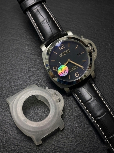 This watch is a Panerai Luminor Marina, likely model PAM01312 or a similar 44mm Luminor 1950 variant, featuring a black dial and a black leather strap._img_0